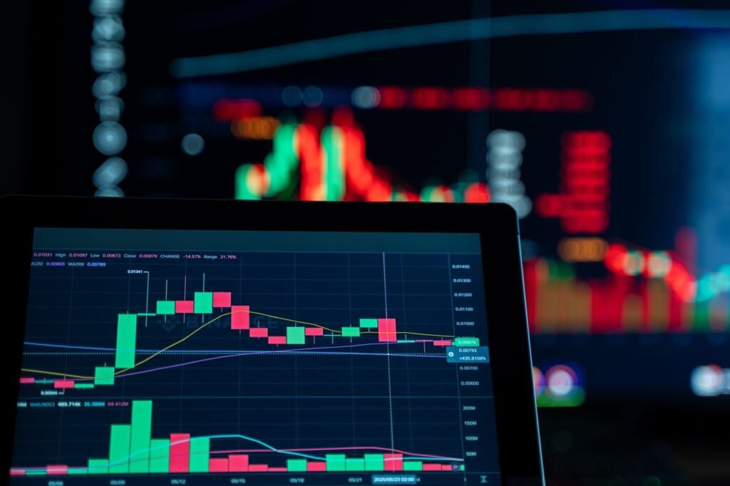 Services Close-up view of digital trading chart screen with vibrant graphs and data analysis.